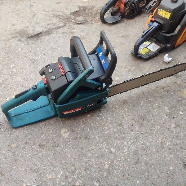 Makita DCS 341 Chainsaw 4