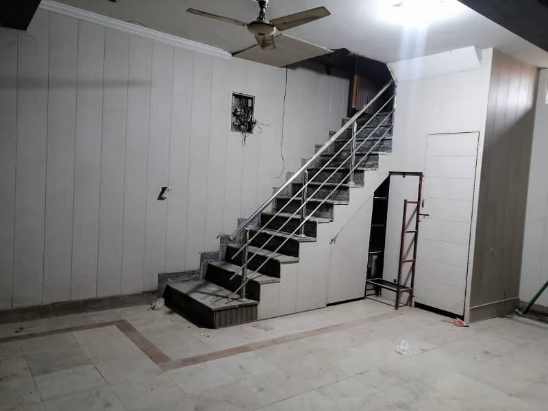 5 Marla Tile Flooring Basement Available For Rent F-1 Block Johar Town 2