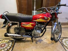 honda 125 Karachi number 10/10 condition red colour