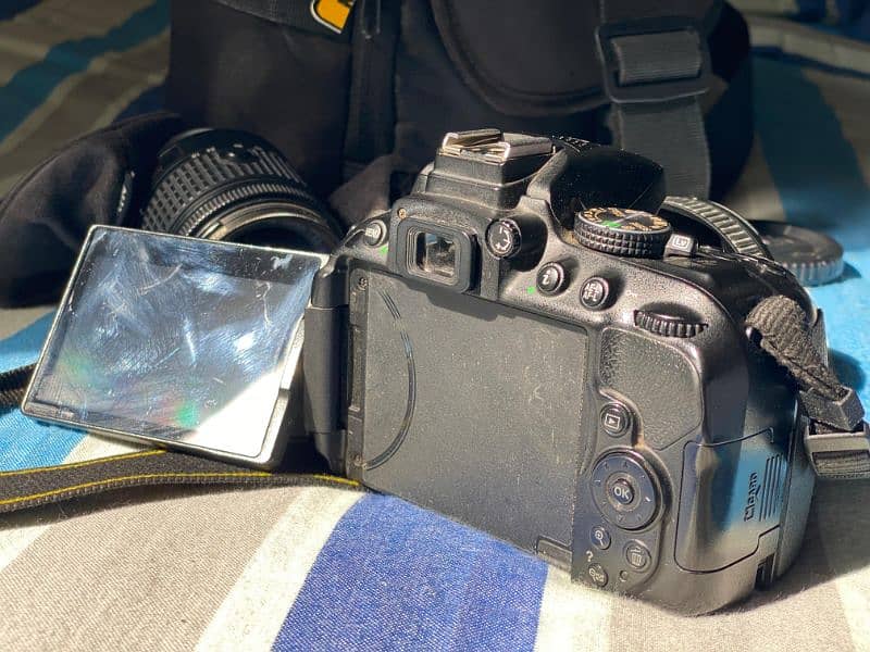 Nikon D5300 with kit lens and prime lens 50MM 1.8 with Camera Bag 4