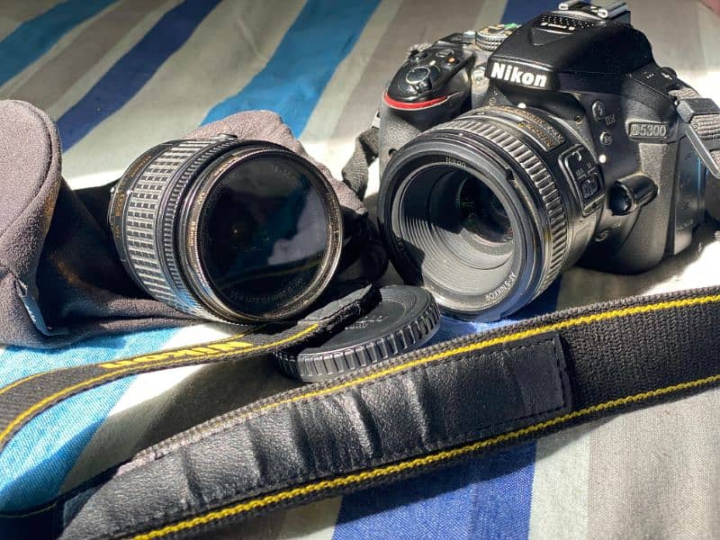 Nikon D5300 with kit lens and prime lens 50MM 1.8 with Camera Bag 7