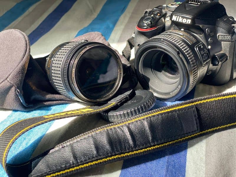 Nikon D5300 with kit lens and prime lens 50MM 1.8 with Camera Bag 8