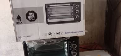 baking & giriling oven new urgent sell just three time use 25 litter