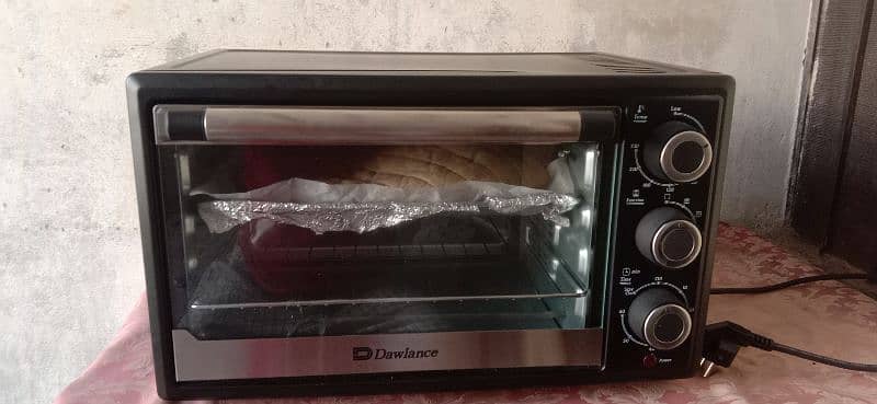 baking & giriling oven new urgent sell just three time use 25 litter 10