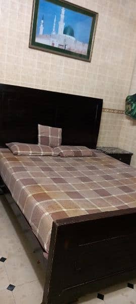 bed with out foam with side table in good condition 2