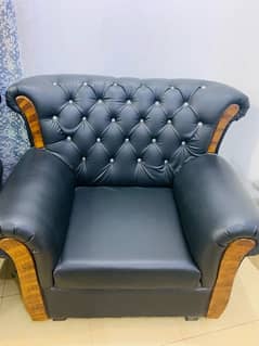 Black coloured royal style sofa set