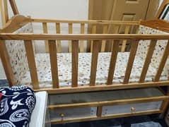 Baby cot with swing