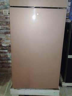 Dawlance fridge in brown wood color