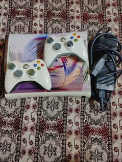 Xbox 360 with one power supply and 2 brand new controller