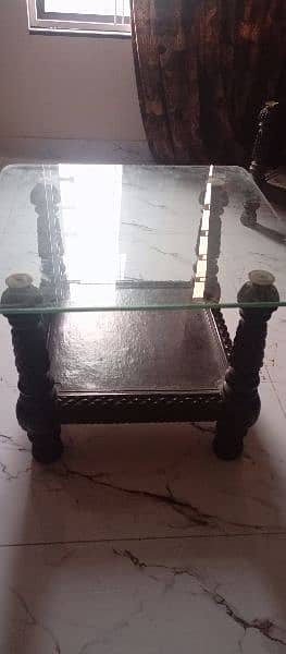 one table set one center and two side table 3