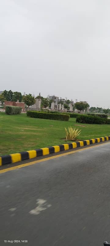 20 MARLA RESIDENTIAL PLOT FOR SALE WITH POSSESSION @ MAIN 60 FEET ROAD IN NEW LAHORE CITY PHASE 4 5