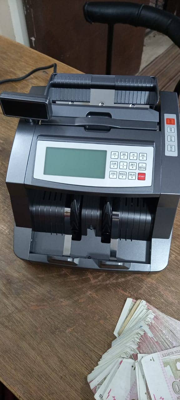 cash counting machine with fake note detection , valiue, seiral nmbr 7