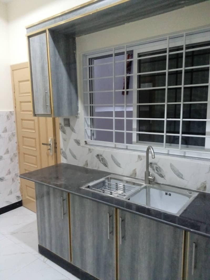 14 marla ground portion with 3 bedrooms for rent in CBR town . 2