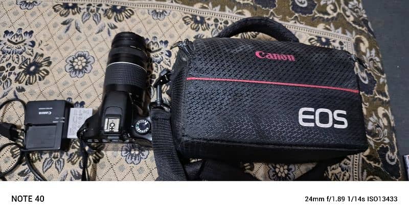 Canon 550D DSLR with 75-300mm Lens, Bag, and Charger – 10/9 3