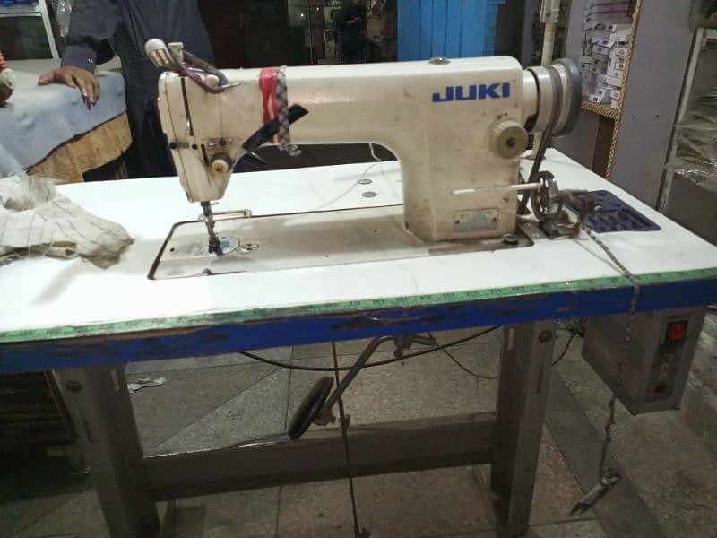 Tailor Shop with all machinery and stock 4