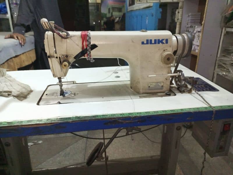 Tailor Shop with all machinery and stock 5