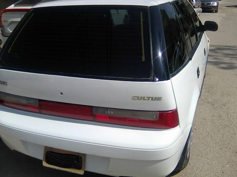 SUZUKI CULTUS VXR MODEL 2004 WHITE BEHTREEN CONDITION CALL 03401394443 7