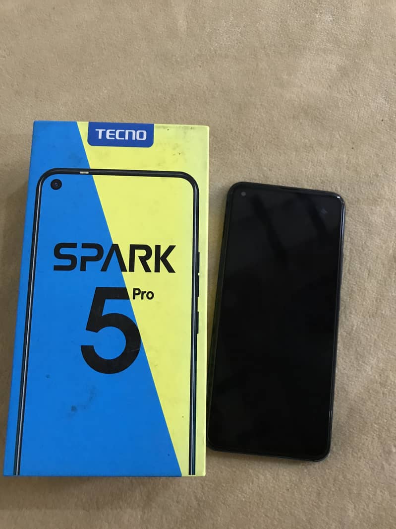 Tecno spark 5pro with box and charger 0