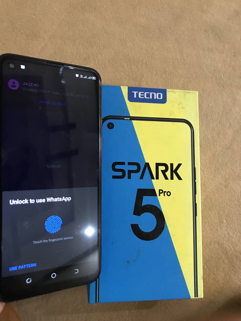 Tecno spark 5pro with box and charger 3