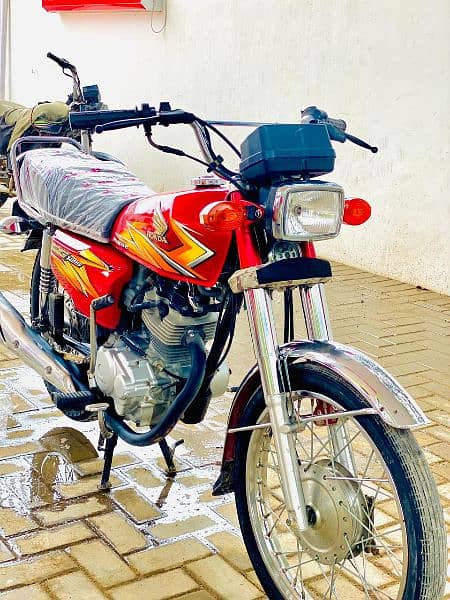 Honda cg 125 2021 good condition first owner karachi number 9