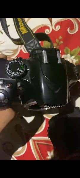 DSLR D3200 with 18-55mm lens 0