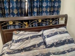 an old wooden bed is for sale . . .