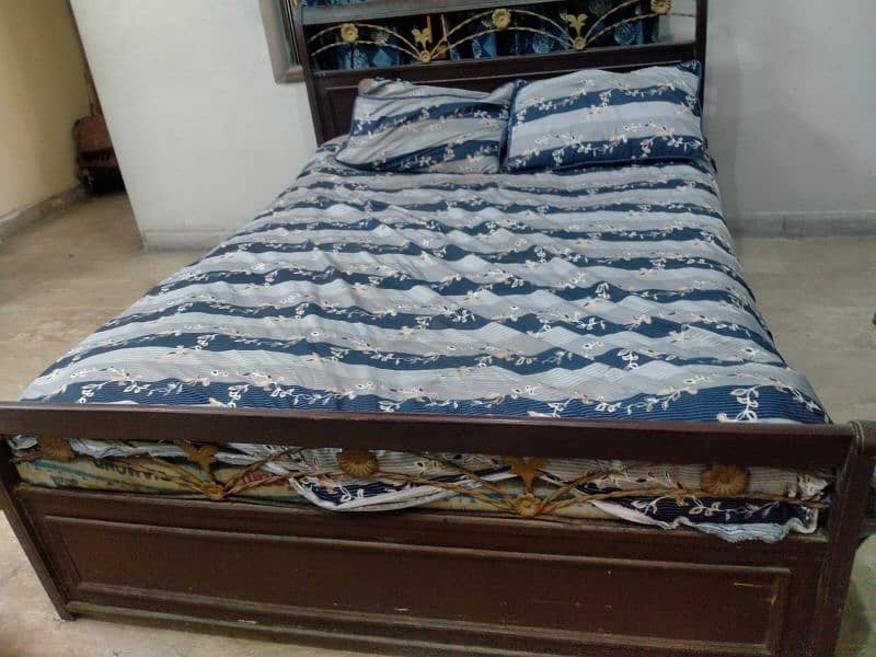 an old wooden bed is for sale . . . 1