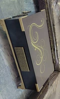 table brand new brown with goldn colour