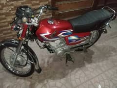 red  honda 125 original bike first owner one hand use