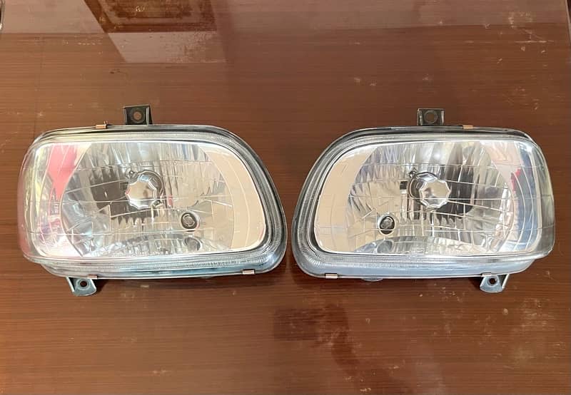 Diahatsu Cuore Headlight pair 0