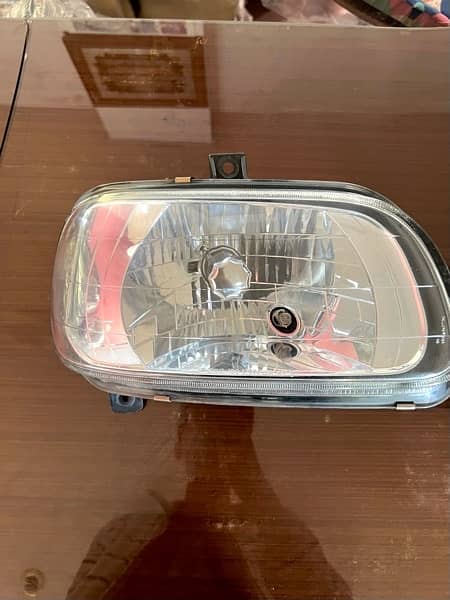 Diahatsu Cuore Headlight pair 1