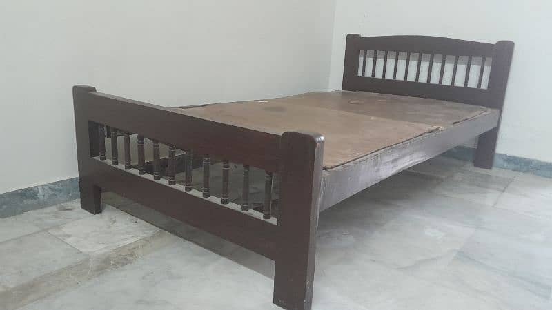 Single wooden bed for sale 1