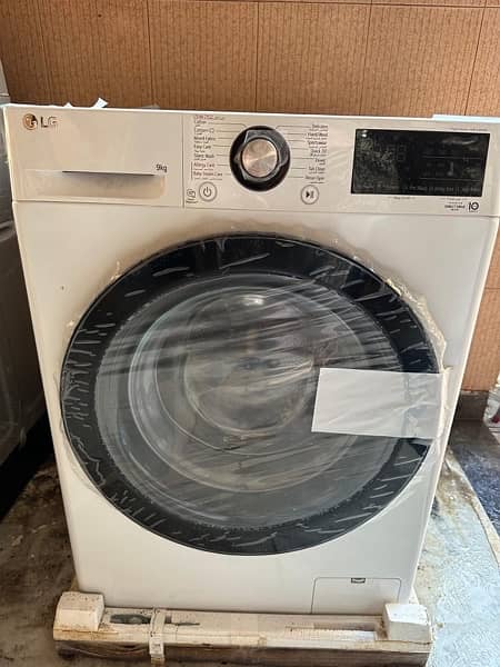 LG front load 9KG washing machine brand new 1