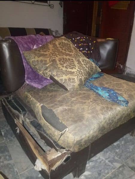 Sofa set used and fabric in torn condition 2