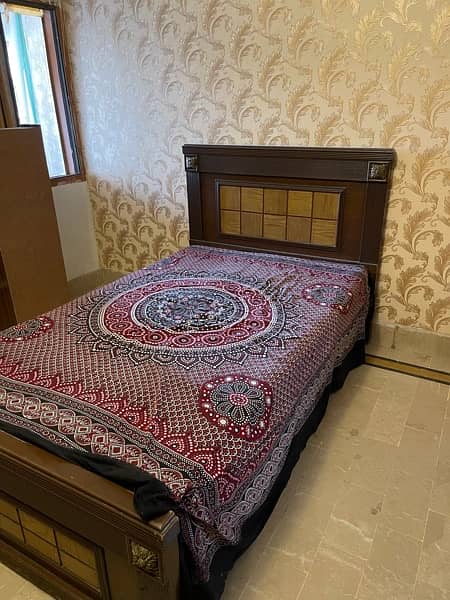 wooden made single bed with matress. 3