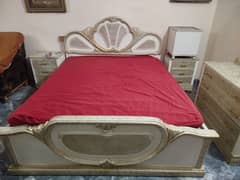 full bed with mattress side tables and dressing