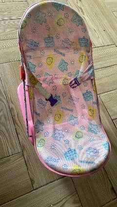 baby bath chair in pink colour