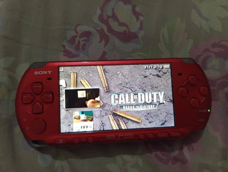 PSP Slim 3003 model with 8GB Memory card & original adapter 2