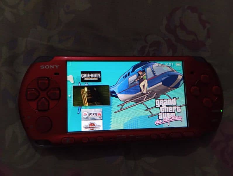 PSP Slim 3003 model with 8GB Memory card & original adapter 3