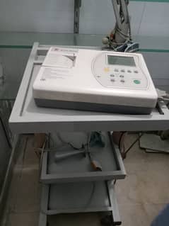 Ecg machine  and trolly for sale Good