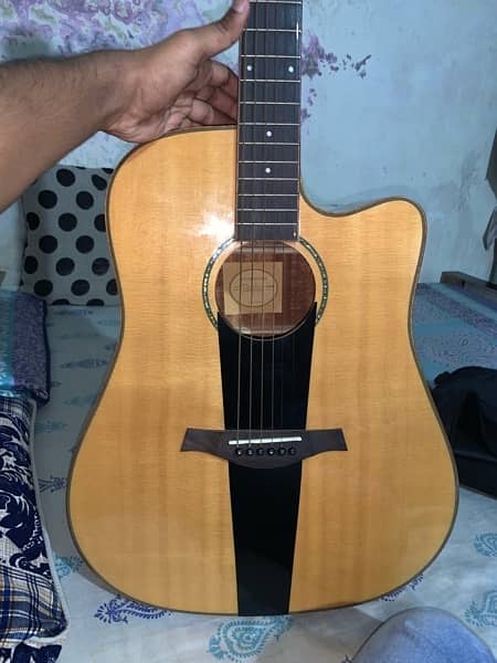 Taylor Guitar available original wooden contact on WhatsApp only 2