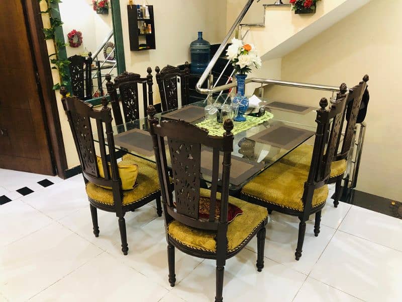 like new dining table with chairs made of wood 5