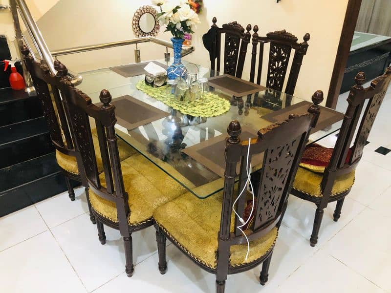 like new dining table with chairs made of wood 6