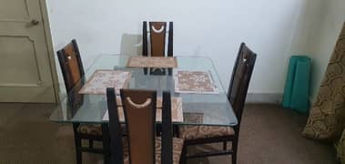 wooden dinning table with 4 chairs