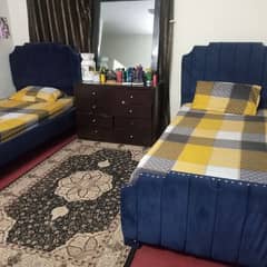 Two single cushion bed