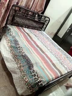 Iron bed with mattress