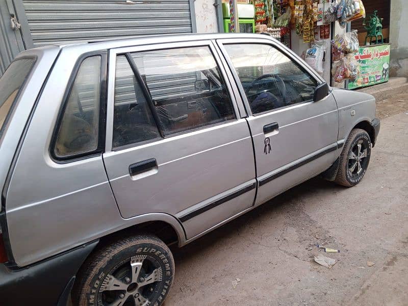 Suzuki Mehran VXR 2001 urgent sail exchange possible with bike 2