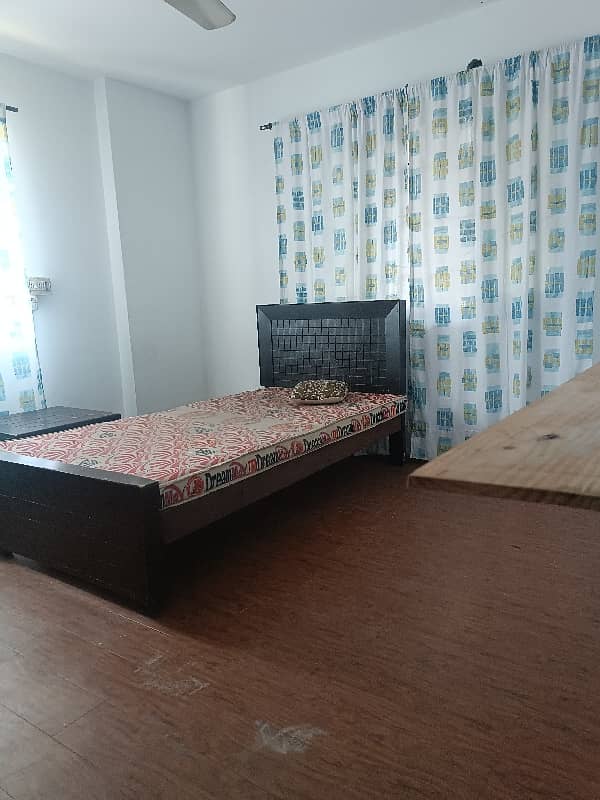 gulberg3 
2 kanal house upper portion furnished room attach bathroom kitchen tv lounge car parking good location available for rent contact Magsi Estate 1