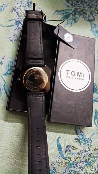 Tomi watch 1