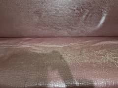 Brown leather sofa combed